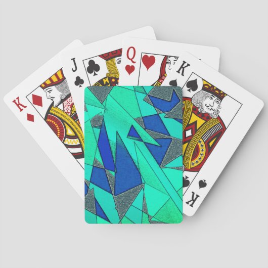 緑の三角形の切り出し、青い背景、粗い トランプ (裏面)