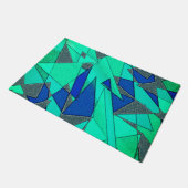 緑の三角形の切り出し、青い背景、粗い ドアマット (アングル)