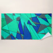 緑の三角形の切り出し、青い背景、粗い ビーチタオル (正面)