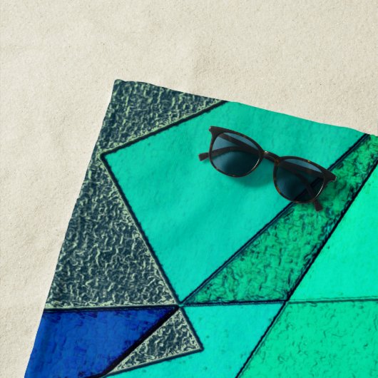 緑の三角形の切り出し、青い背景、粗い ビーチタオル (インサイチュ)