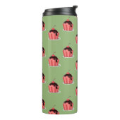 緑の上にピンクのアイスクリームカップ タンブラー (回転左)