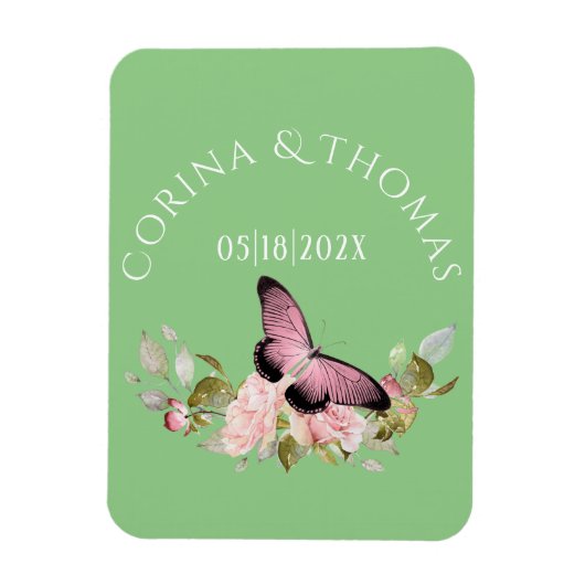 緑の上のピンクの花と結婚蝶 マグネット (縦)