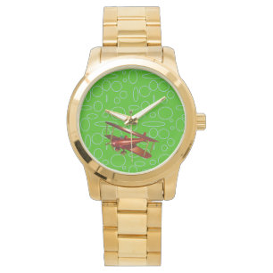 緑の円とループ上の赤い飛行機 腕時計