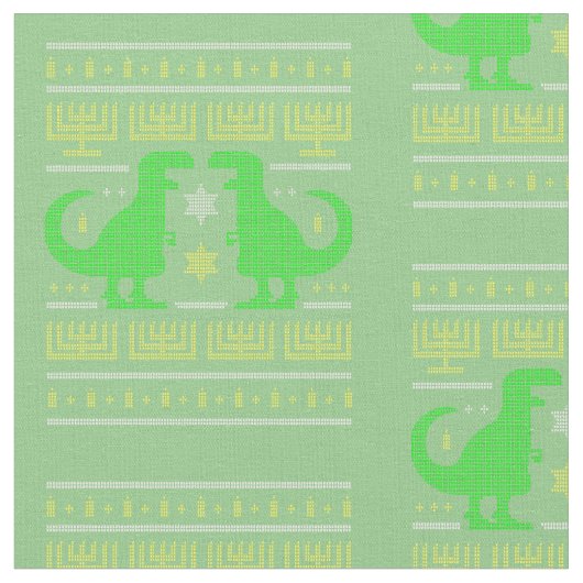 緑の恐竜ハヌカーの醜いセーター ファブリック (クローズアップ)