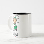 緑の棒の姿のチアリーダーのTシャツおよびギフト ツートーンマグカップ (正面左)