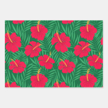 緑の熱帯の花に赤いハイビスカスの離れ花