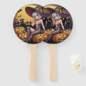 緑の目をしたハロウィンの魔女が、ジャック・オ・ランタンの上に ハンドファン (正面&裏面)