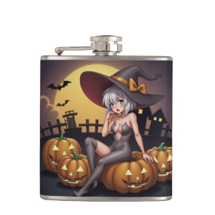 緑の目をしたハロウィンの魔女が、ジャック・オ・ランタンの上に フラスク