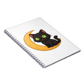 緑の目を浮かべて白熱［赤熱］光を放つ微笑む黒猫 ノートブック (右側)