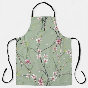 緑の背中に小さな赤と黄色の花模様 エプロン