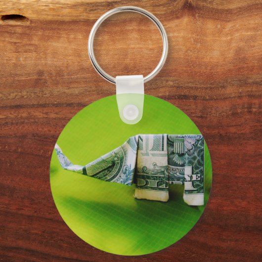 緑の背景にドル紙幣の折り紙ゾウ キーホルダー (正面)