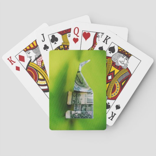 緑の背景にドル紙幣の折り紙ゾウ トランプ (裏面)