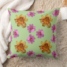 緑の背景にユリやコスモスの花