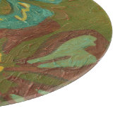 緑の背景に水色と焦げたオレンジ色の花 カッティングボード (角)