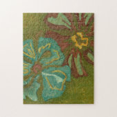 緑の背景に水色と焦げたオレンジ色の花 ジグソーパズル (縦)