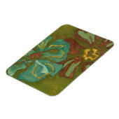 緑の背景に水色と焦げたオレンジ色の花 マグネット (左側)