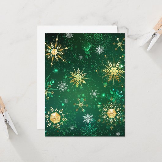 緑の背景に金のクリスマスの雪の結晶 カード (正面/裏面インサイチュ)