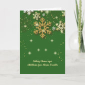 緑の背景に金の雪の結晶が舞うアイルランドのクリスマスカード シーズンカード (正面)