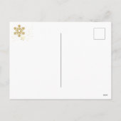 緑の背景に金の雪の結晶が舞うアイルランド語のクリスマスカード シーズンポストカード (裏面)