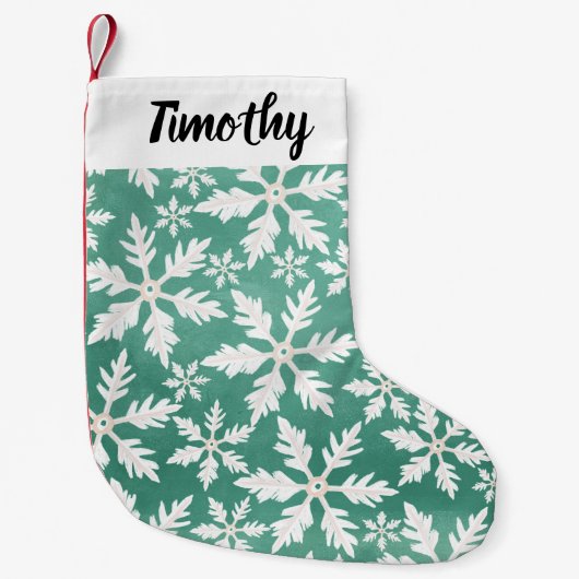 緑の背景に降り注ぐ大きな白い雪 スモールクリスマスストッキング (正面)