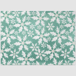 緑の背景に降り注ぐ大きな白い雪 薄葉紙