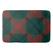 緑の背景に黒と赤のボールまたは穴 バスマット (正面)