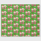 緑の背景のサンタクロース夫妻 ラッピングペーパー (フラット)