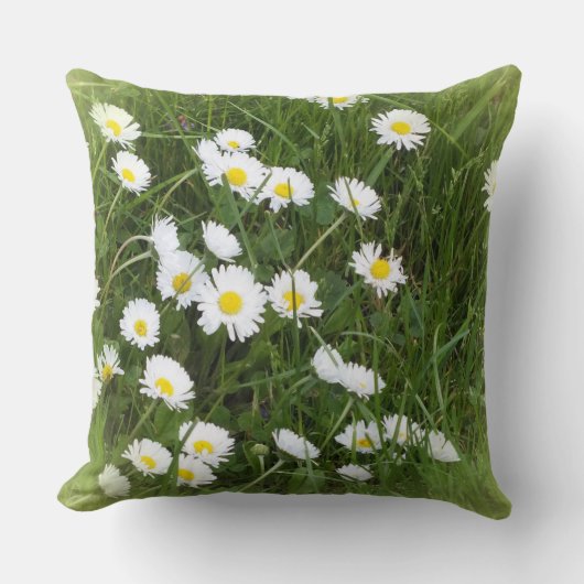 緑の背景の前の明るい大きな花 クッション (正面)