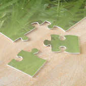 緑の背景の前の明るい大きな花 ジグソーパズル (側面)