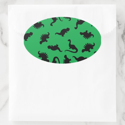 緑の背景パターンの恐竜のシルエット 楕円形シール (バッグ)
