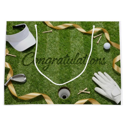 緑の芝生にCongratulationsと書かれたゴルフボール ラージペーパーバッグ (正面)
