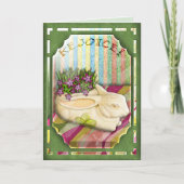 緑の花屋店の窓のイースターのウサギプランター シーズンカード (正面)