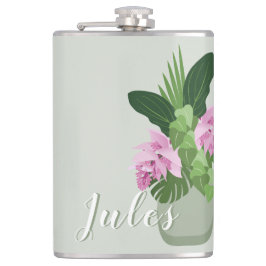 緑の花瓶名の熱帯メディニラピンクの花 フラスク