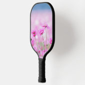 緑の花畑のイメージを持つピックボールのパドル ピックルボールラケット (左)
