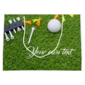 緑の草にカラフルティーを付けたゴルフボール ラージペーパーバッグ (正面)