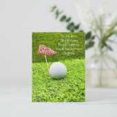 緑の草の上にゴルフボールを持つゴルフクリスマス シーズンポストカード (スタンド正面)