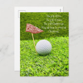 緑の草の上にゴルフボールを持つゴルフクリスマス シーズンポストカード (正面/裏面)