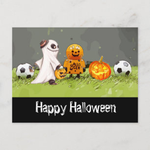 緑の草の上にボールを持つサッカーハッピーハローウィン ポストカード