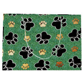 緑の草の上に黄褐色と黒い前足が印刷される ラージペーパーバッグ (裏面)