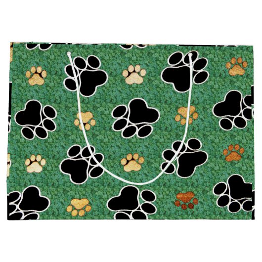 緑の草の上に黄褐色と黒い前足が印刷される ラージペーパーバッグ (裏面)