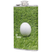 緑の草の上のゴルフボール フラスク (左)