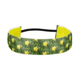 緑の草の中の黄色いバターカップ アスレチックヘッドバンド