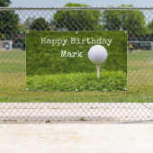 緑の草の背景でゴルフボールがT型に表示される 横断幕 (インサイチュ)