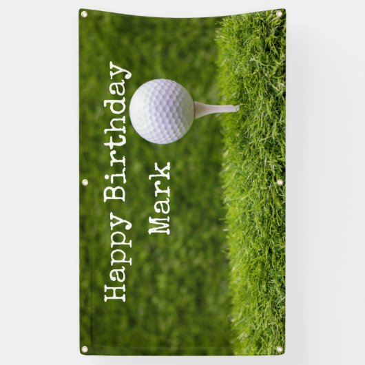緑の草の背景でゴルフボールがT型に表示される 横断幕 (縦)