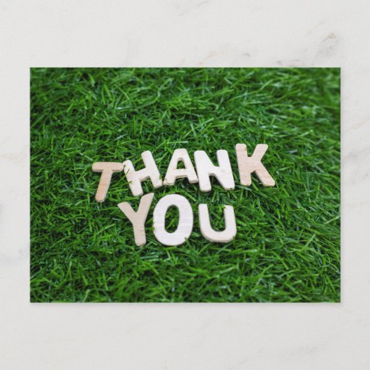 緑の草の背景に「ありがとう」の文字 ポストカード (正面)