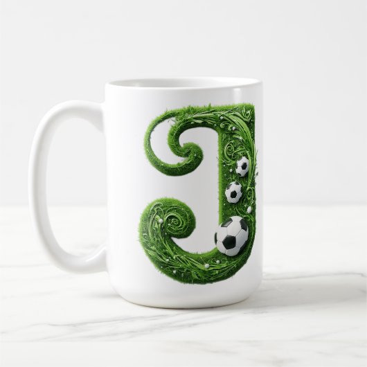 緑の草むらのJ文字 サッカーボール コーヒーマグカップ (左)