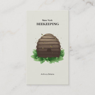 緑の葉とブラウンのミツバチの巣とミツバチ 名刺