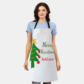 緑の赤いクリスマスツリー陽気なクリスマスの名前を追加 エプロン (着用した状態)