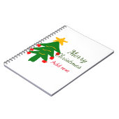 緑の赤いクリスマスツリー陽気なクリスマスの名前を追加 ノートブック (左側)