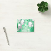 緑の《写真》ぼけ味のオーナメントの球の銀製のトナカイの喜び ポストイット (オフィス)